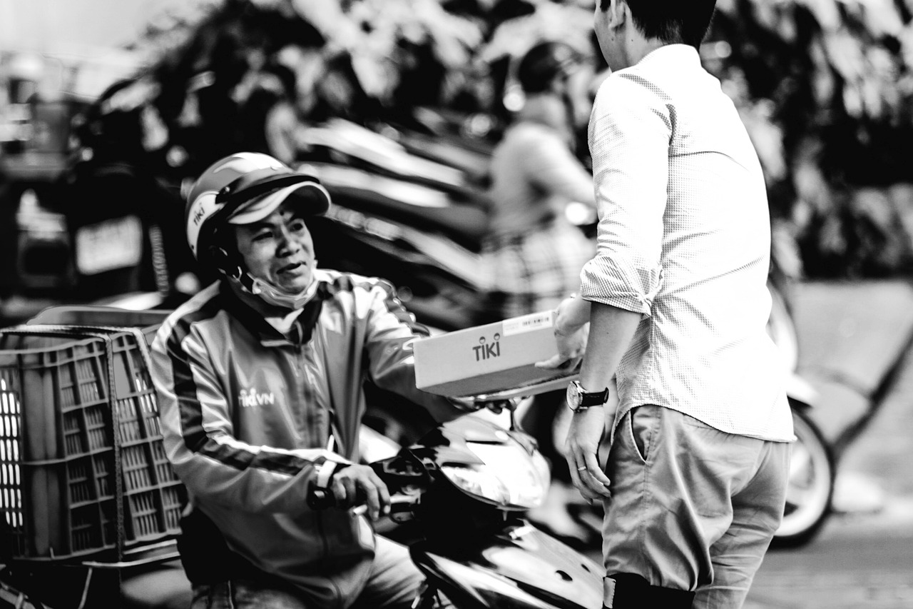 courier delivering package doorstep